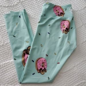 Feed Me Fight Me donut skull leggings